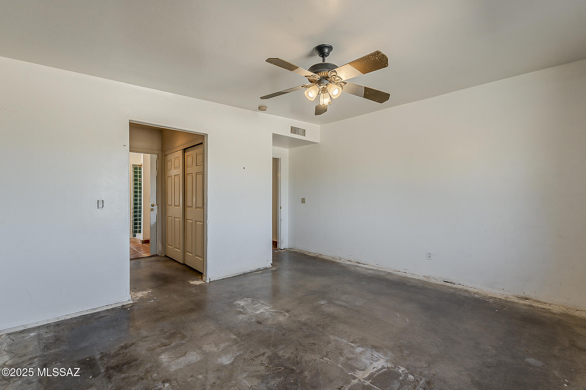 1503 Camino Bacalao Rio Rico, AZ 85648 - Photo 20 of 43 wooden floor in an empty room