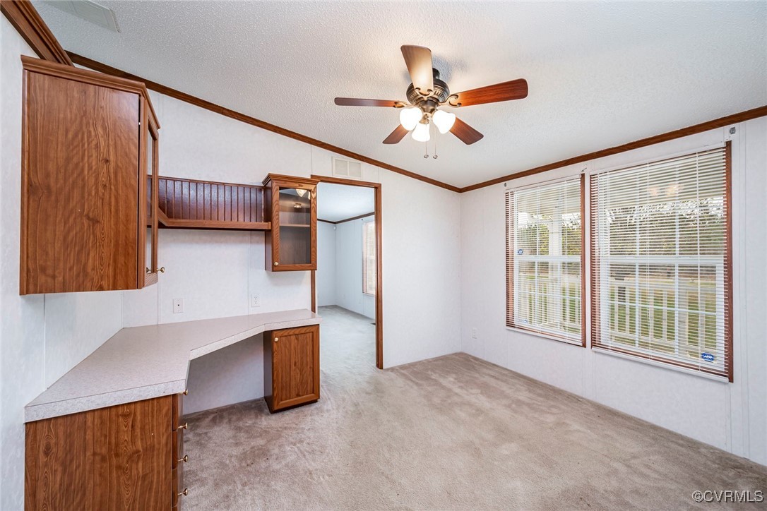 394 Tower Road Brodnax, VA 23920 - Photo 12 of 34 a view of a livingroom with a ceiling fan
