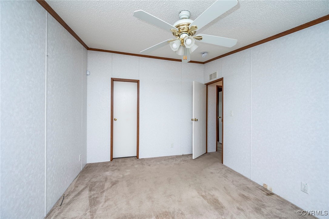 394 Tower Road Brodnax, VA 23920 - Photo 17 of 34 a view of a livingroom with a chandelier fan