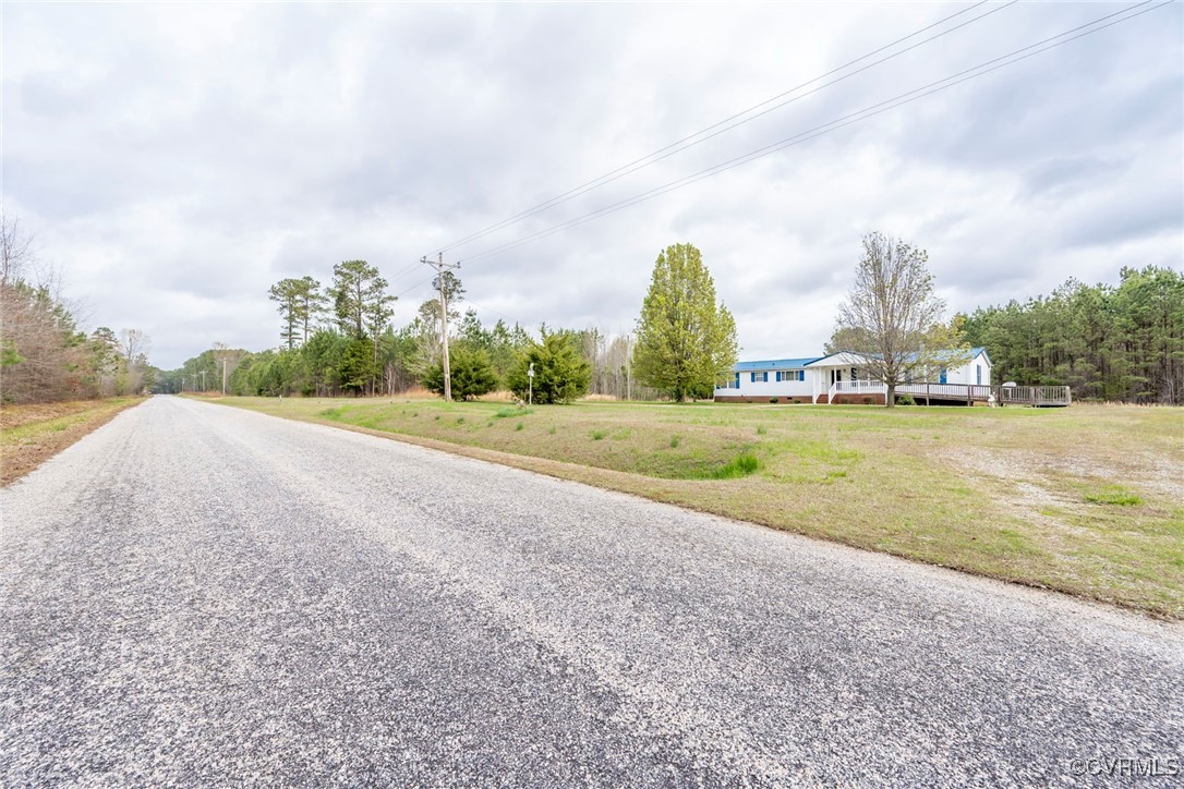 394 Tower Road Brodnax, VA 23920 - Photo 34 of 34 a view of a field with sitting area and garden