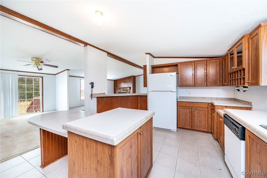 394 Tower Road Brodnax, VA 23920 - Photo 10 of 34 a kitchen with a stove a refrigerator and a sink