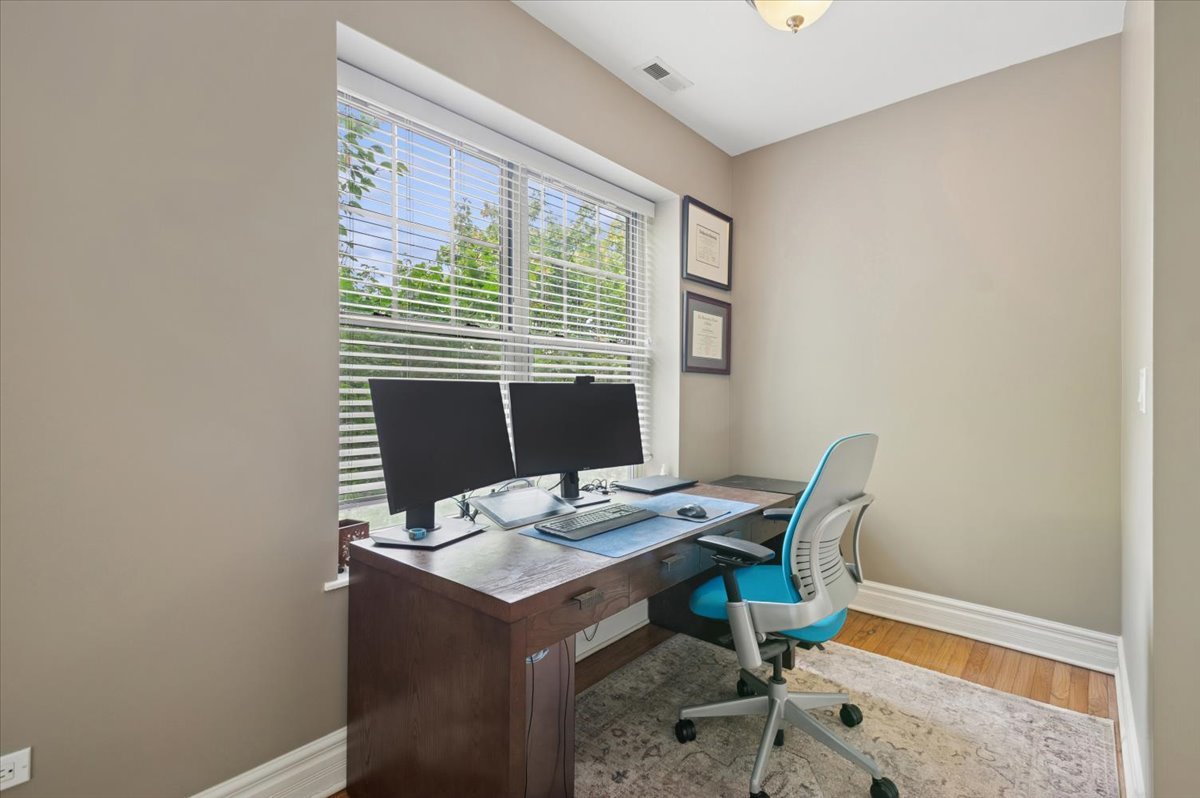 1265 West Granville Avenue, Unit 3 Chicago, IL 60660 - Photo 11 of 15 a view of a dining room with furniture and window