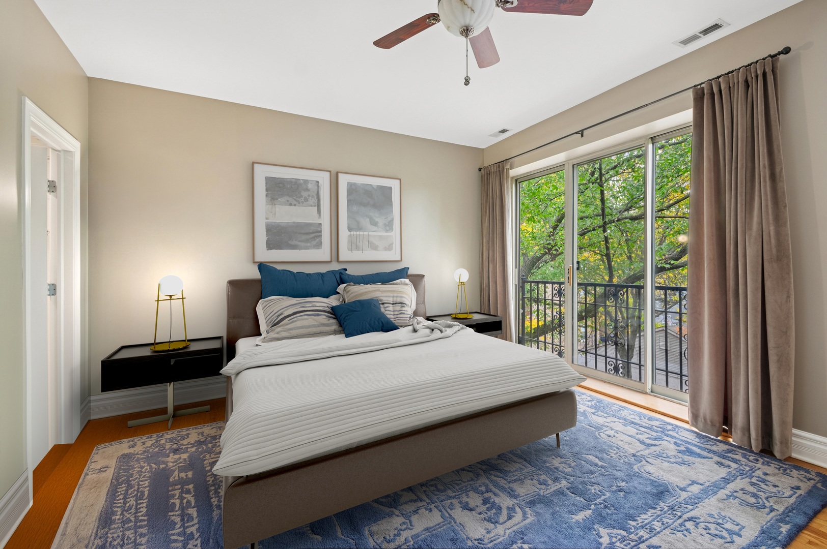 1265 West Granville Avenue, Unit 3 Chicago, IL 60660 - Photo 10 of 15 a bedroom with a large bed and a window