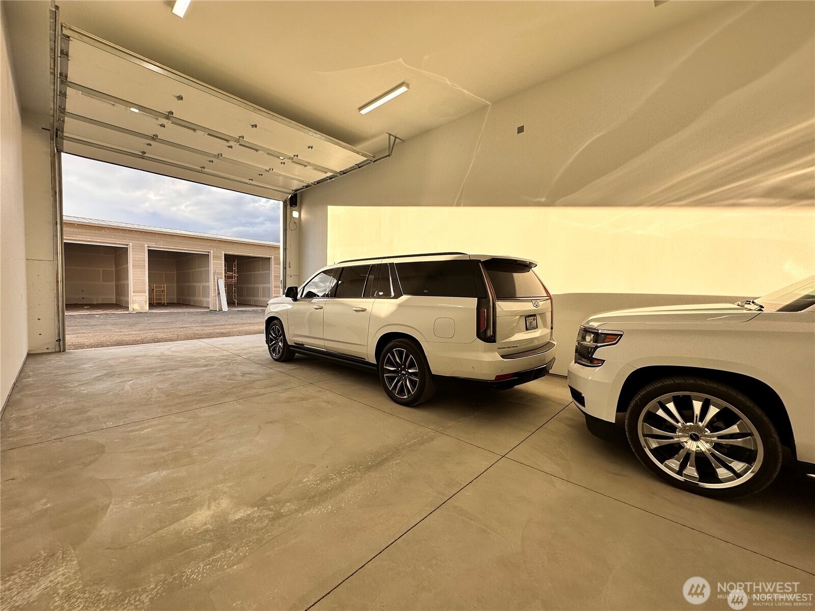 9842 West 9th Road Northwest, Unit A4 Quincy, WA 98848 - Photo 8 of 15 a view of a car in a parking garage