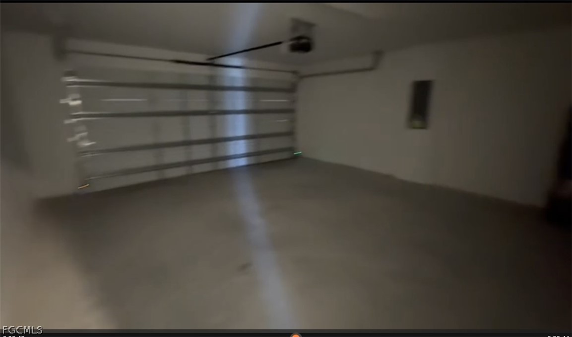 12312 Amber Waves Road Lehigh Acres, FL 33974 - Photo 13 of 32 a empty room with shelves