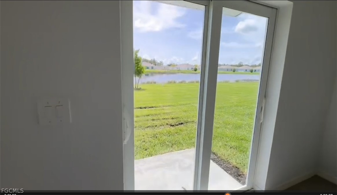 12312 Amber Waves Road Lehigh Acres, FL 33974 - Photo 16 of 32 a view of an outdoor from a window