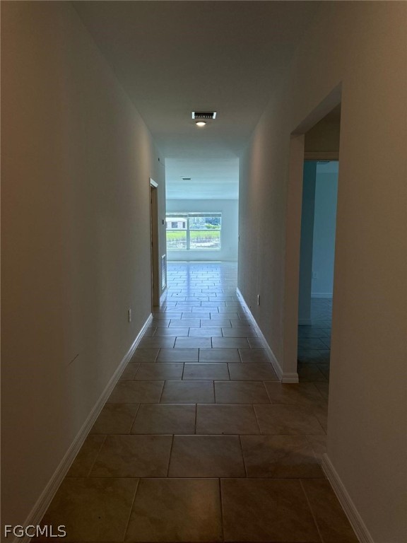 12312 Amber Waves Road Lehigh Acres, FL 33974 - Photo 24 of 32 a view of hallway with window