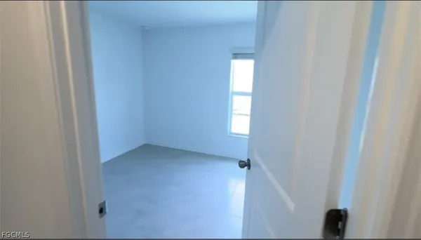 a view of empty room with window