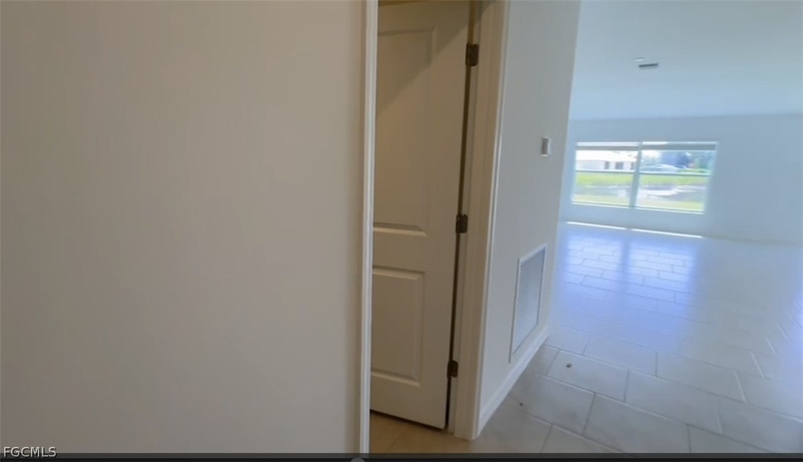 12312 Amber Waves Road Lehigh Acres, FL 33974 - Photo 8 of 32 a view of an empty room