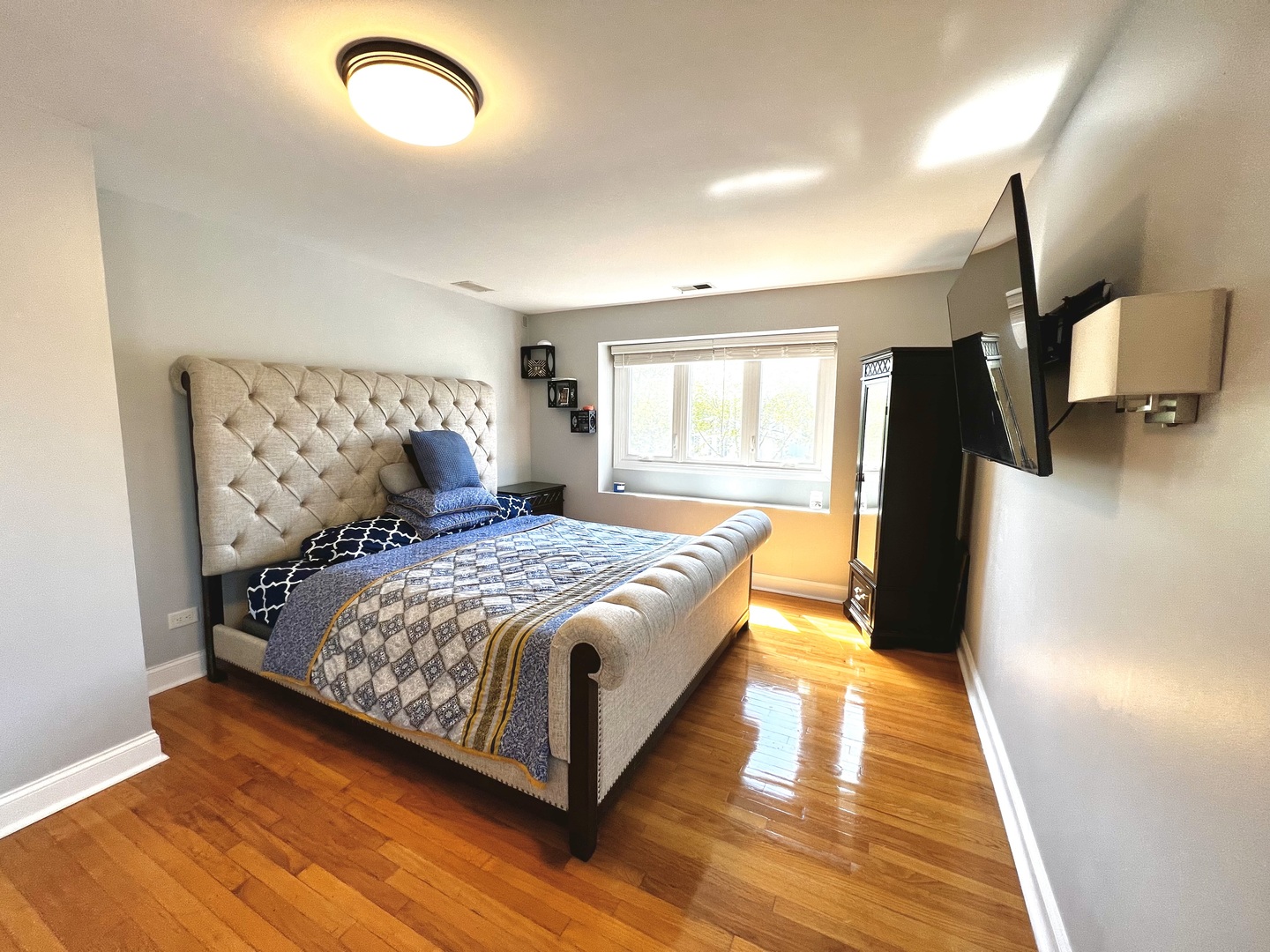 7125 Wirth Drive Darien, IL 60561 - Photo 21 of 38 a bedroom with a bed and wooden floor