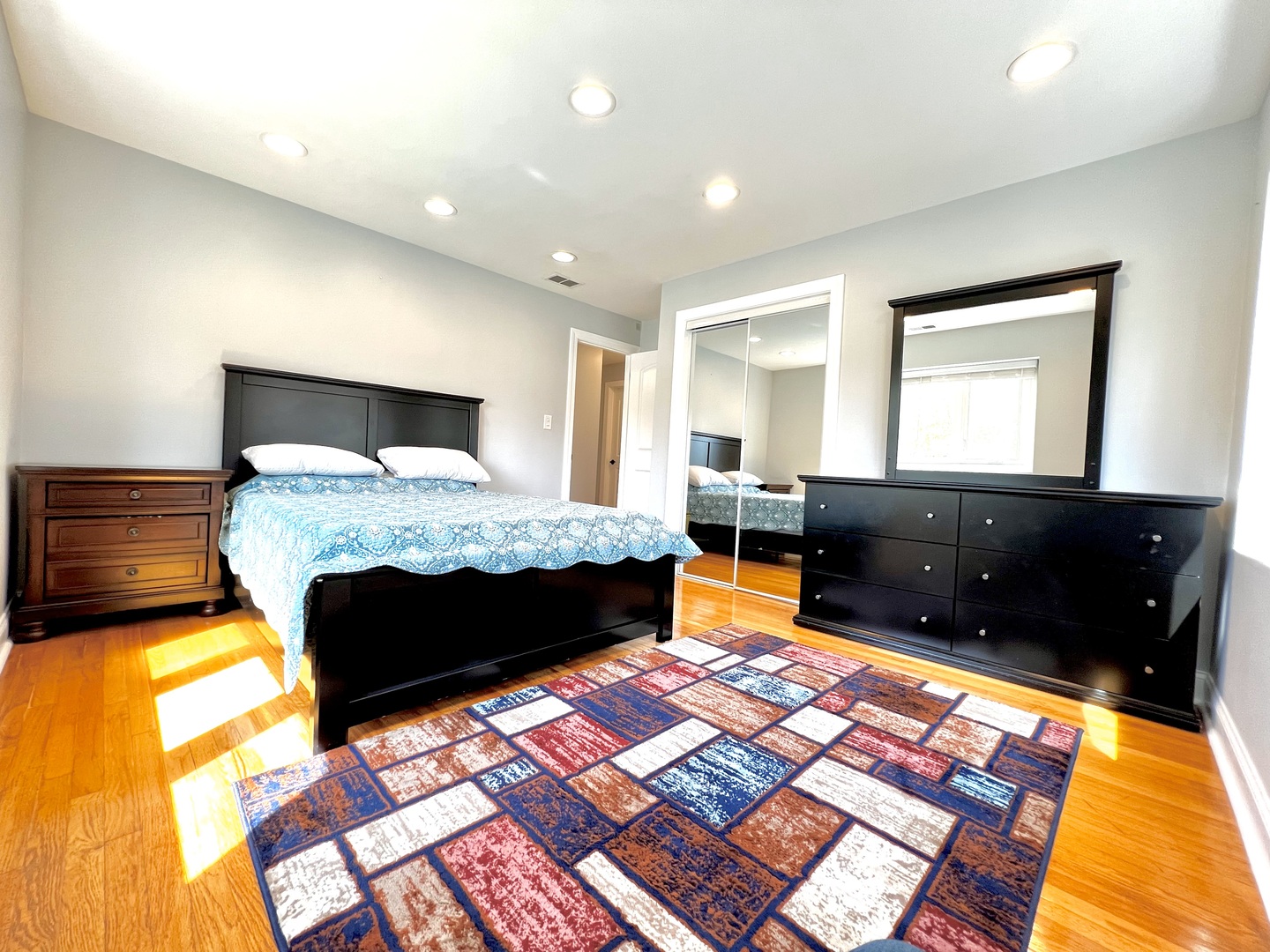7125 Wirth Drive Darien, IL 60561 - Photo 22 of 38 a living room with a bed and a dresser