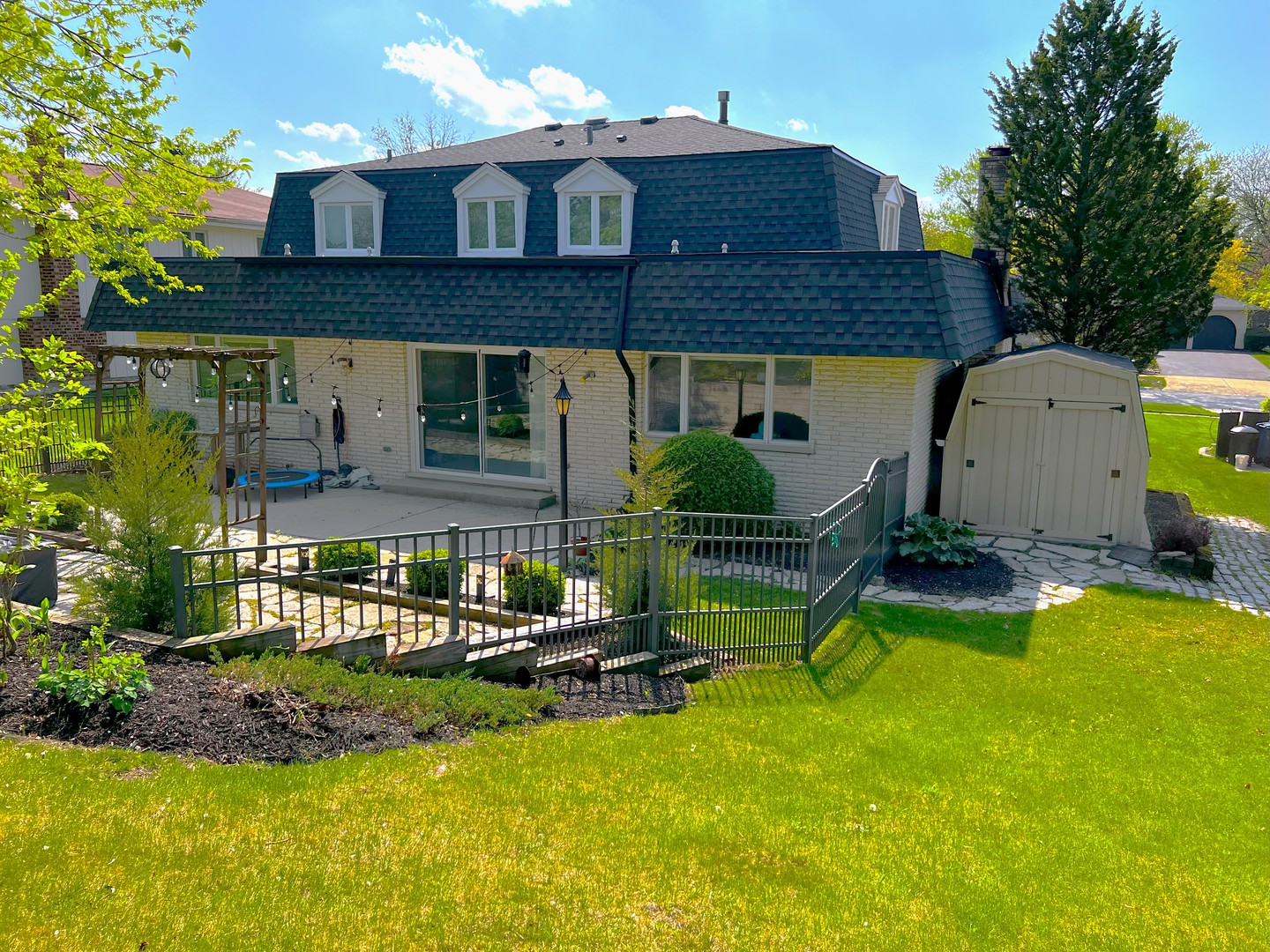 7125 Wirth Drive Darien, IL 60561 - Photo 38 of 38 a view of a house with a yard patio and swimming pool