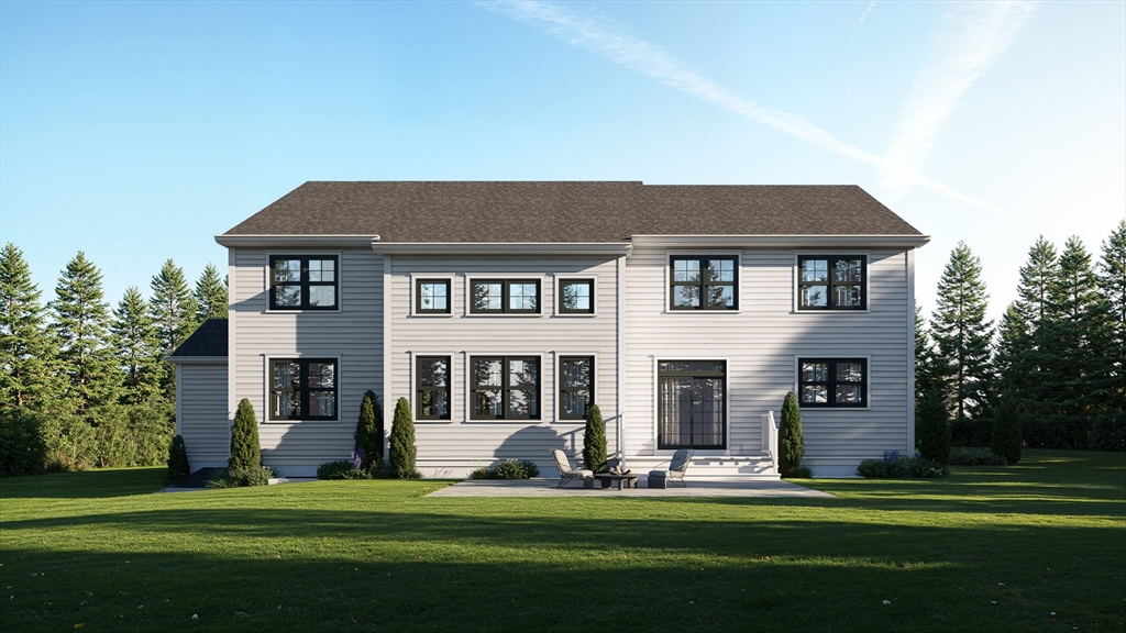 8 Twillingate Road Sudbury, MA 01776 - Photo 4 of 7 a front view of a house with a garden