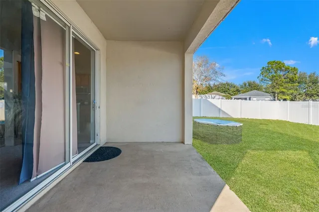 a view of balcony with furniture