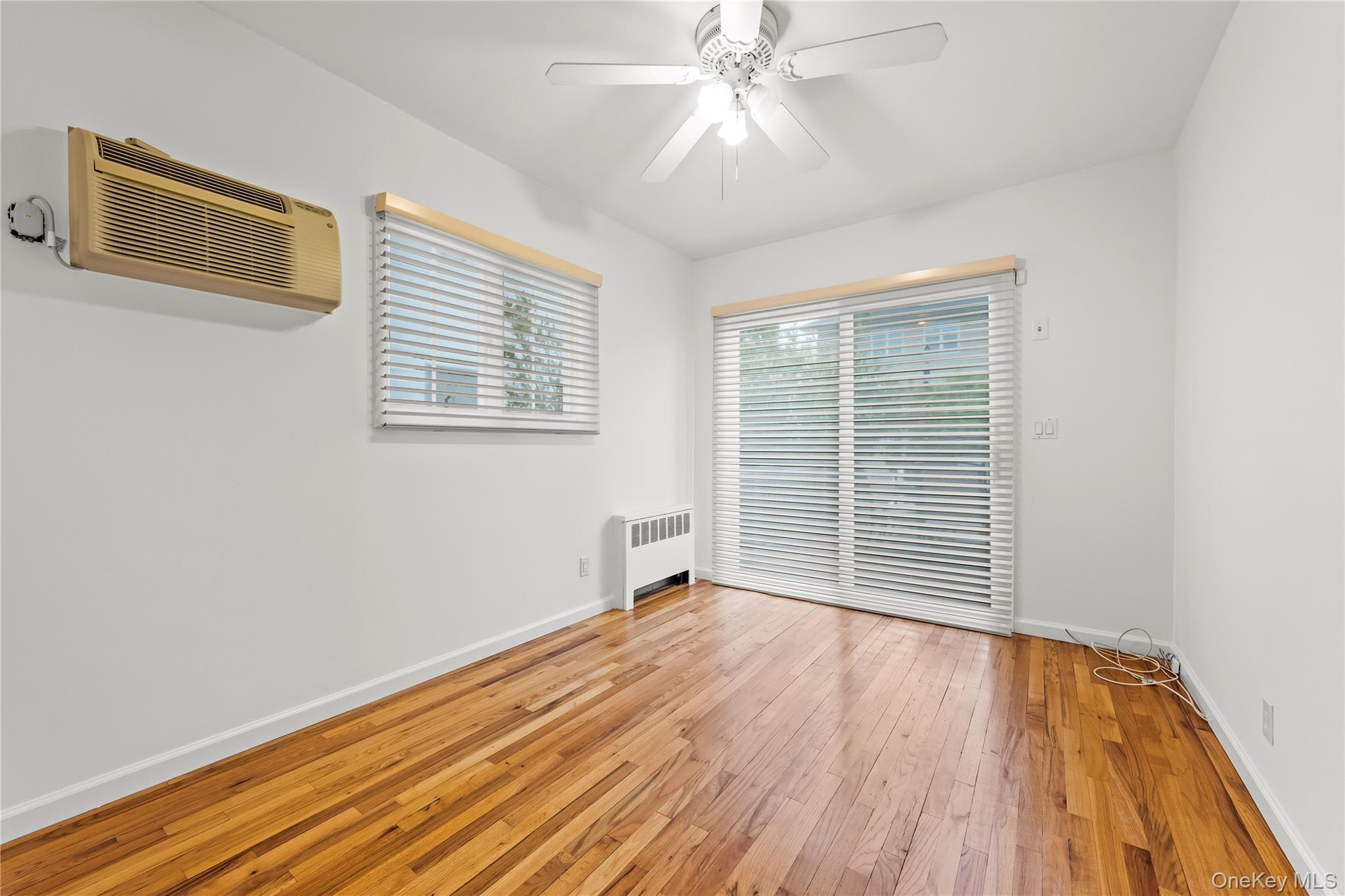 54 Edgewood Road Port Washington, NY 11050 - Photo 8 of 25 First Floor bedroom/den with access to deck.