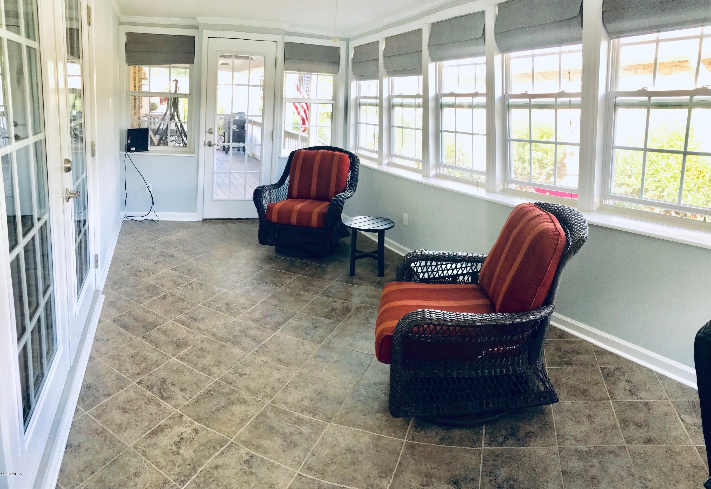 5838 School Road Macon, GA 31216 - Photo 19 of 33 a living room with furniture and a potted plant