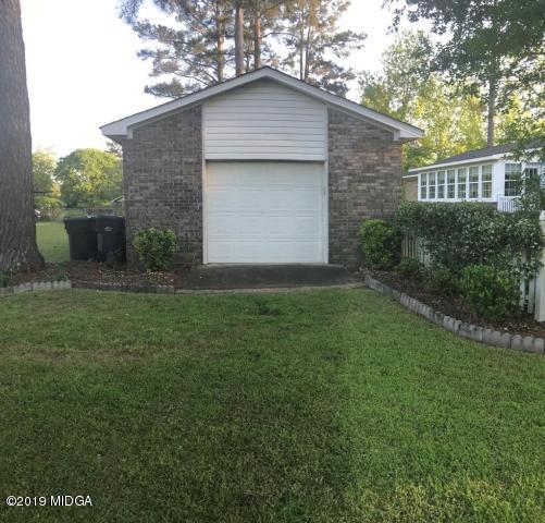 5838 School Road Macon, GA 31216 - Photo 22 of 33 a front view of a house with garden