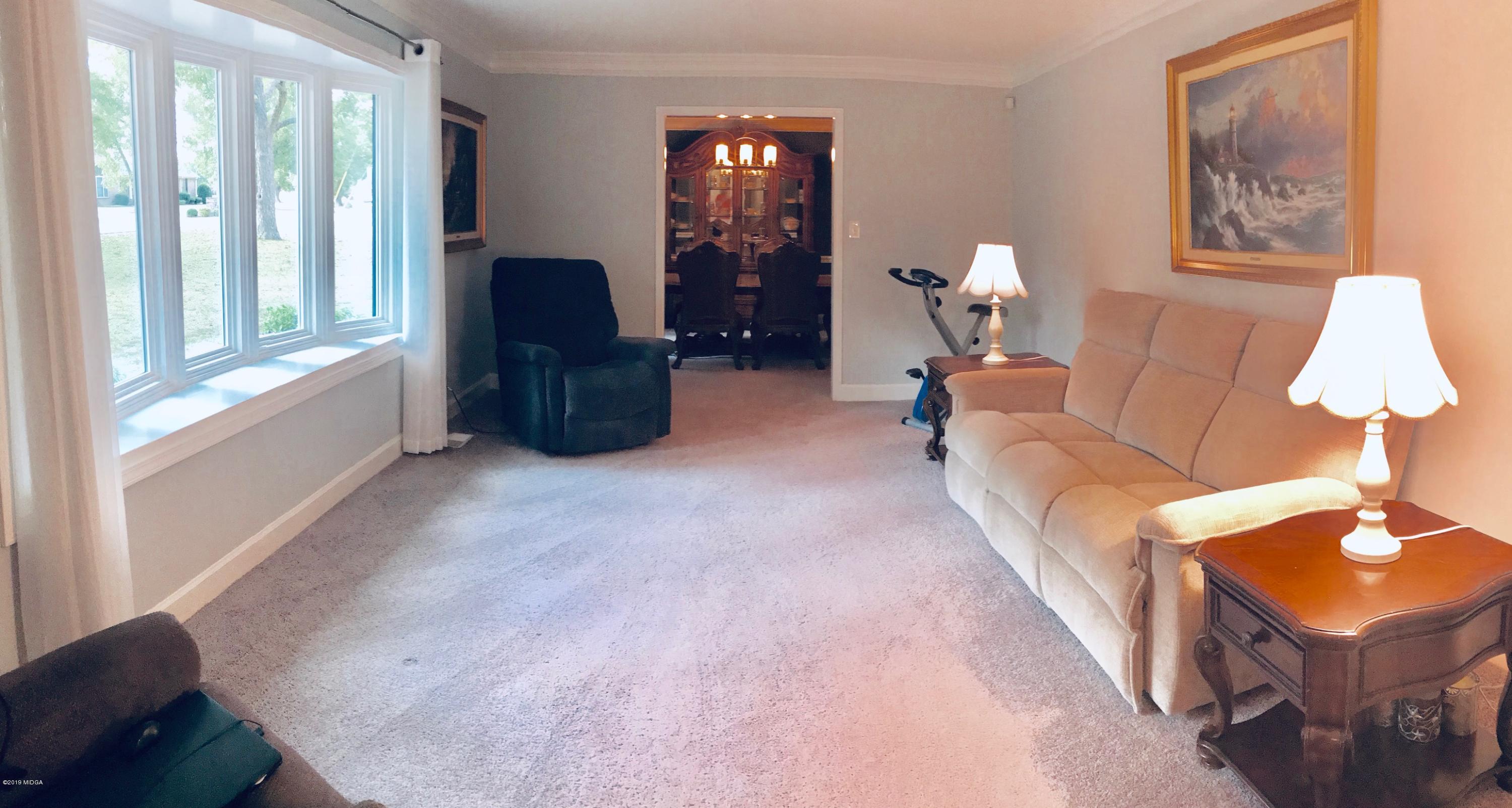 5838 School Road Macon, GA 31216 - Photo 6 of 33 a living room with furniture and a window
