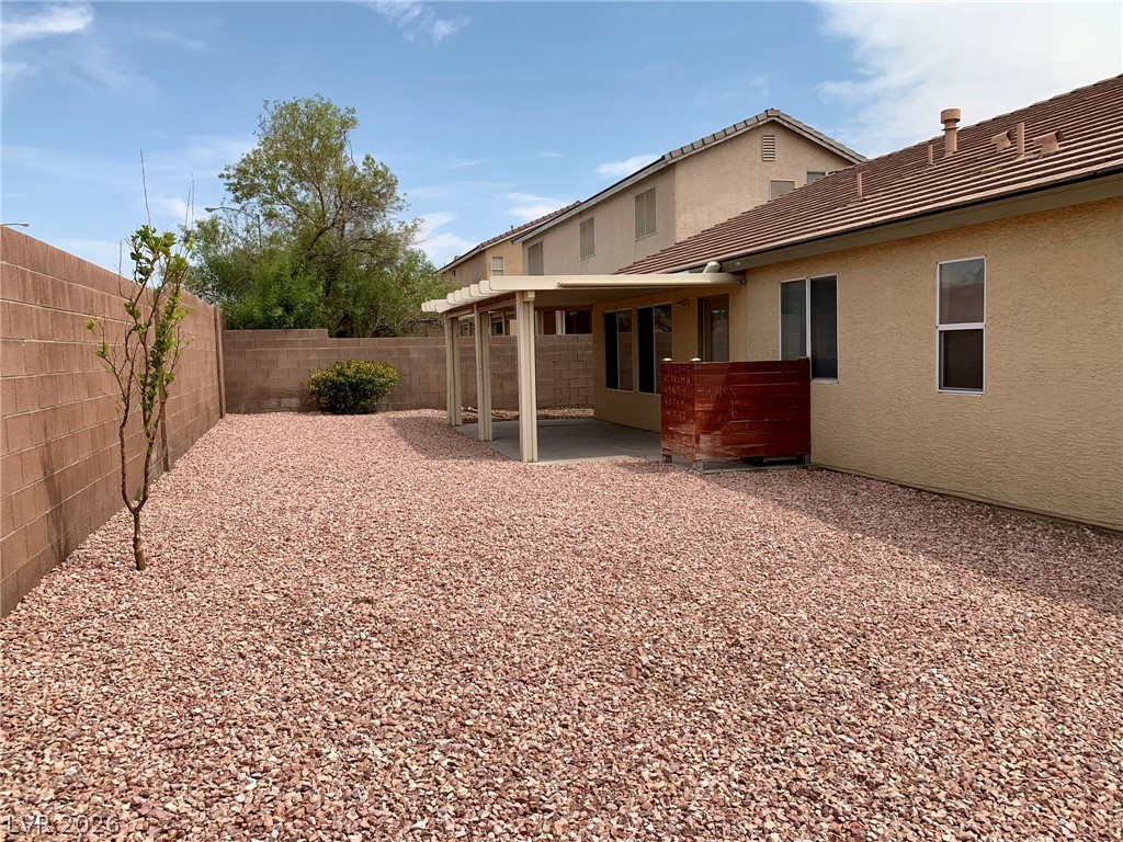 3821 Bombastic Court Las Vegas, NV 89147 - Photo 36 of 36 This private yard offers ample space for outdoor enjoyment and relaxation.