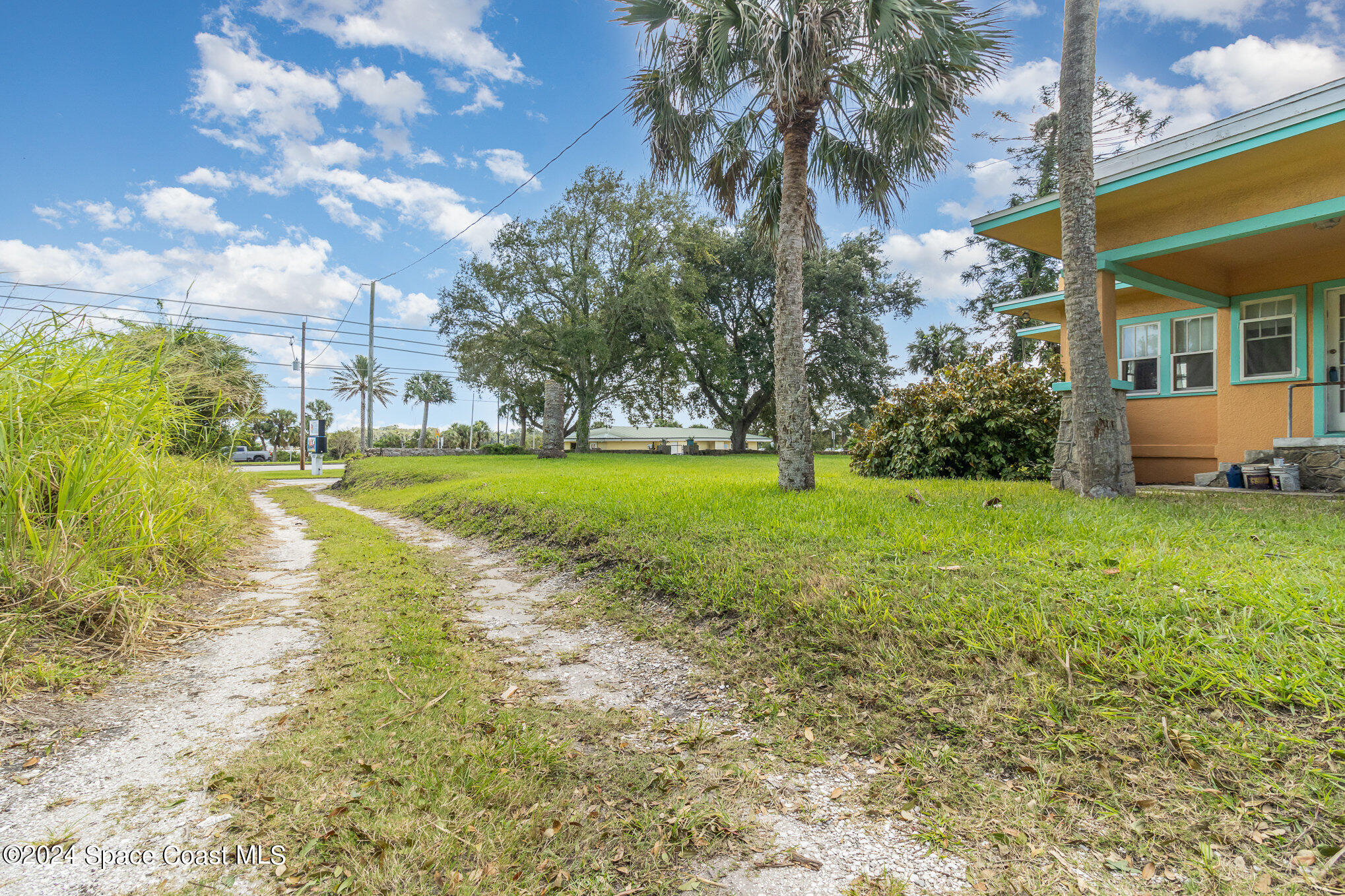 1632 Water Drive Northeast Palm Bay, FL 32905 - Photo 15 of 31 a view of a fountain in front of a house