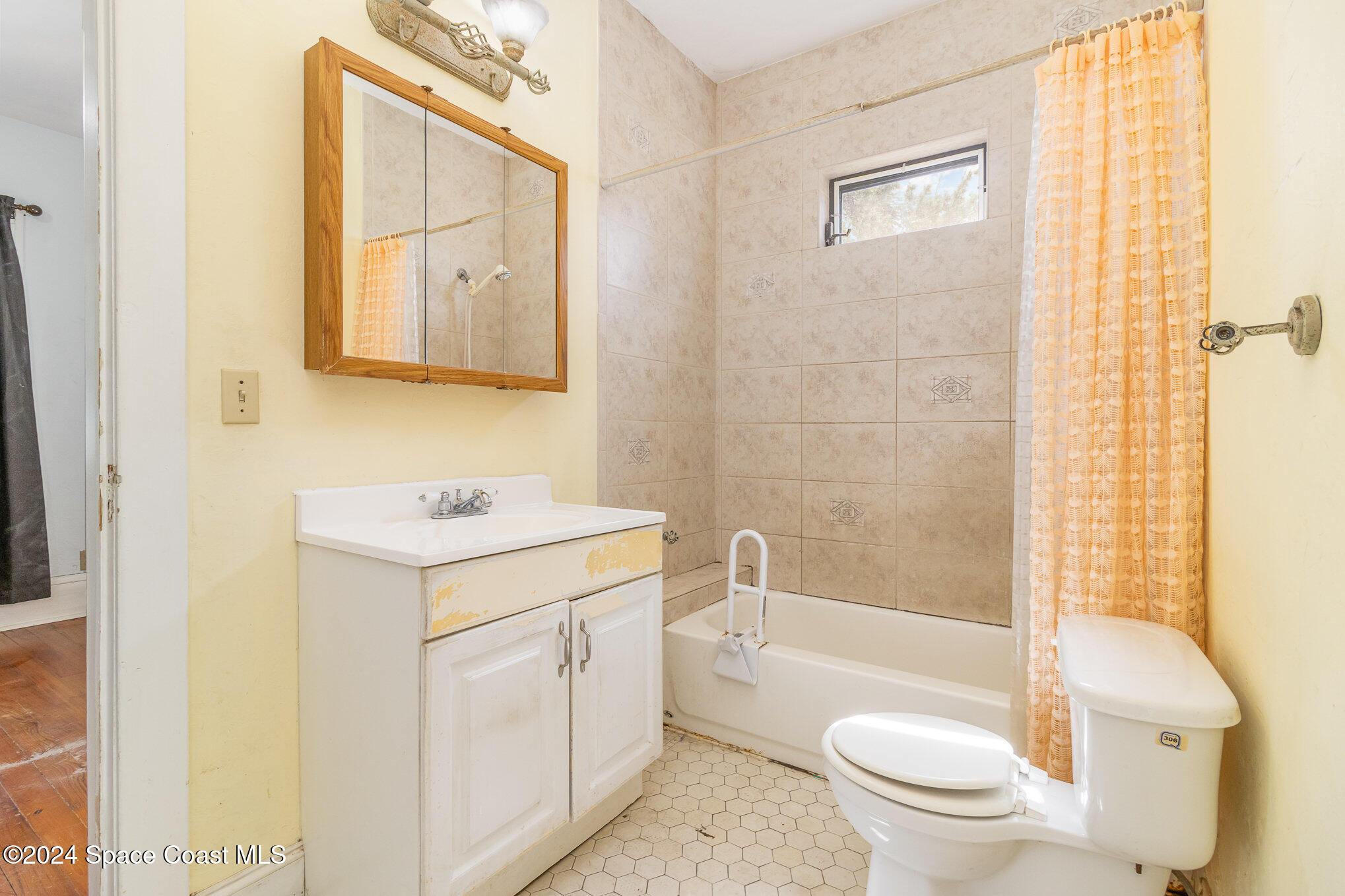 1632 Water Drive Northeast Palm Bay, FL 32905 - Photo 28 of 31 a bathroom with a sink a toilet and shower