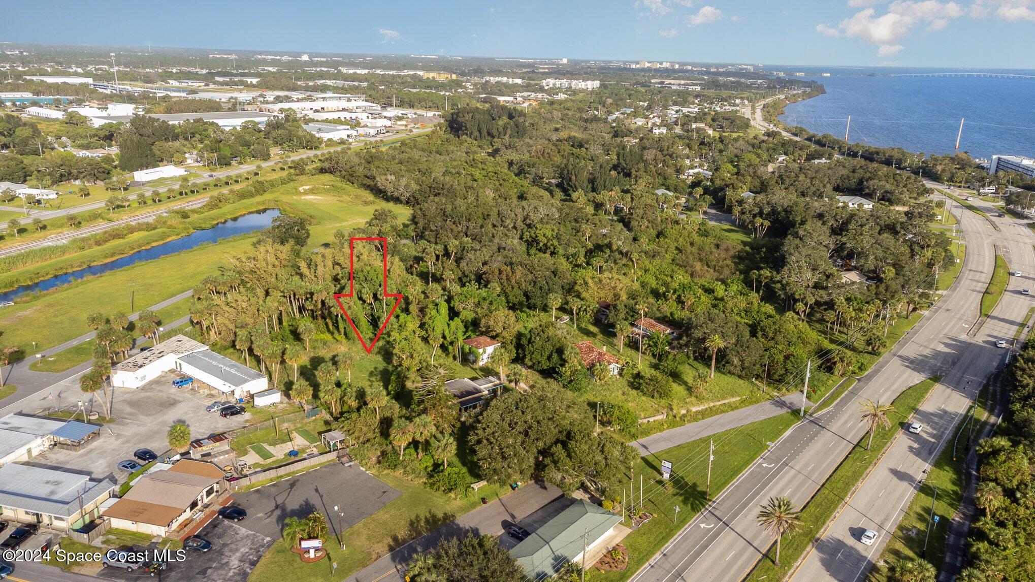 1632 Water Drive Northeast Palm Bay, FL 32905 - Photo 10 of 31 a view of a city with an ocean