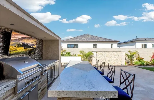 a view of a patio with furniture