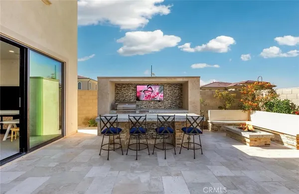 a view of a tables and chairs in patio