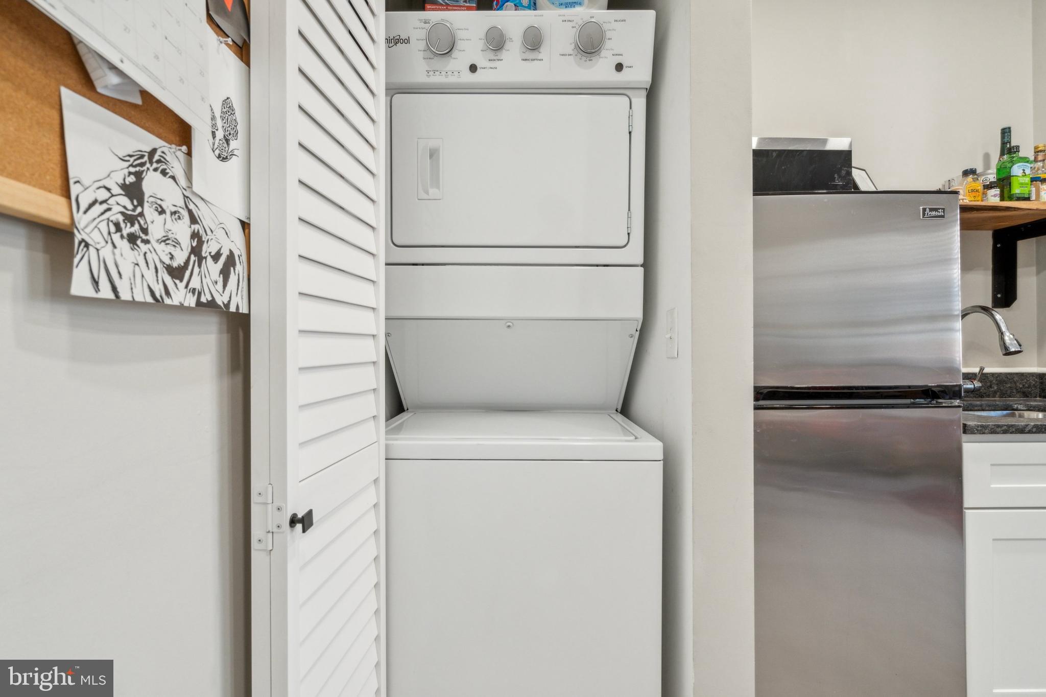 2006 Pine Street, Unit 2 Philadelphia, PA 19103 - Photo 11 of 12 a utility room with dryer and washer