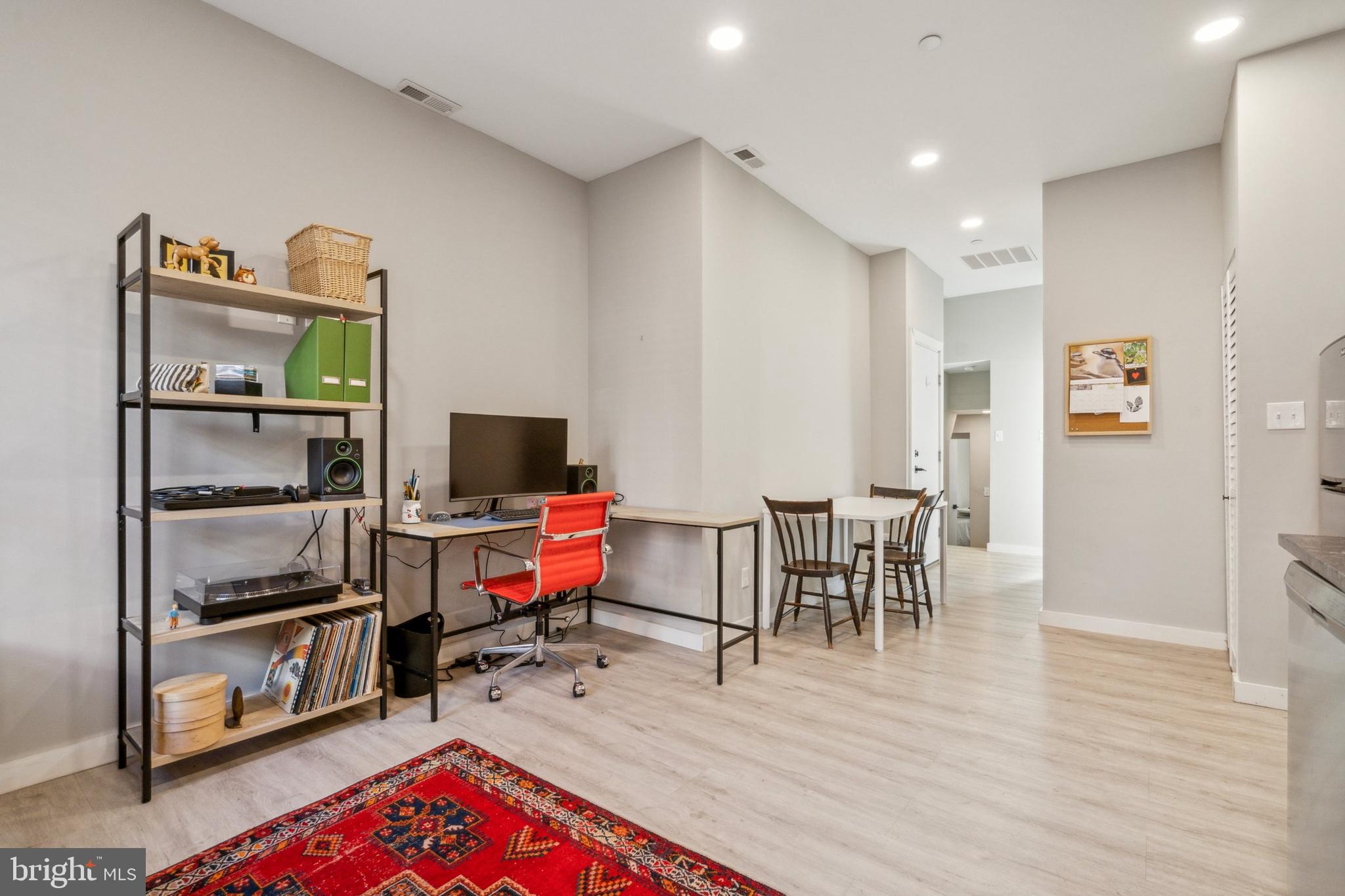 2006 Pine Street, Unit 2 Philadelphia, PA 19103 - Photo 12 of 12 a living room with furniture and a flat screen tv