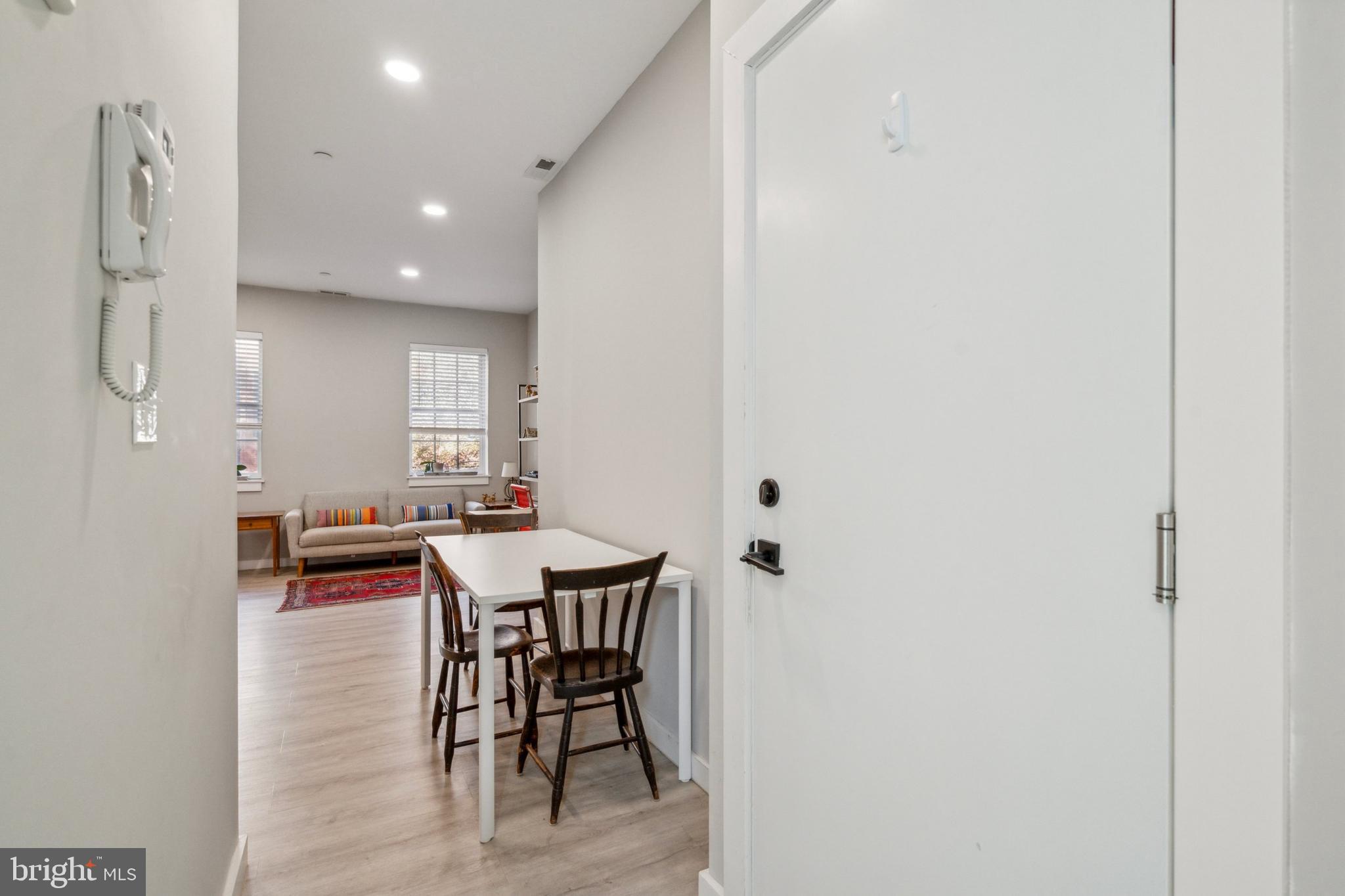 2006 Pine Street, Unit 2 Philadelphia, PA 19103 - Photo 3 of 12 a view of a dining room with furniture