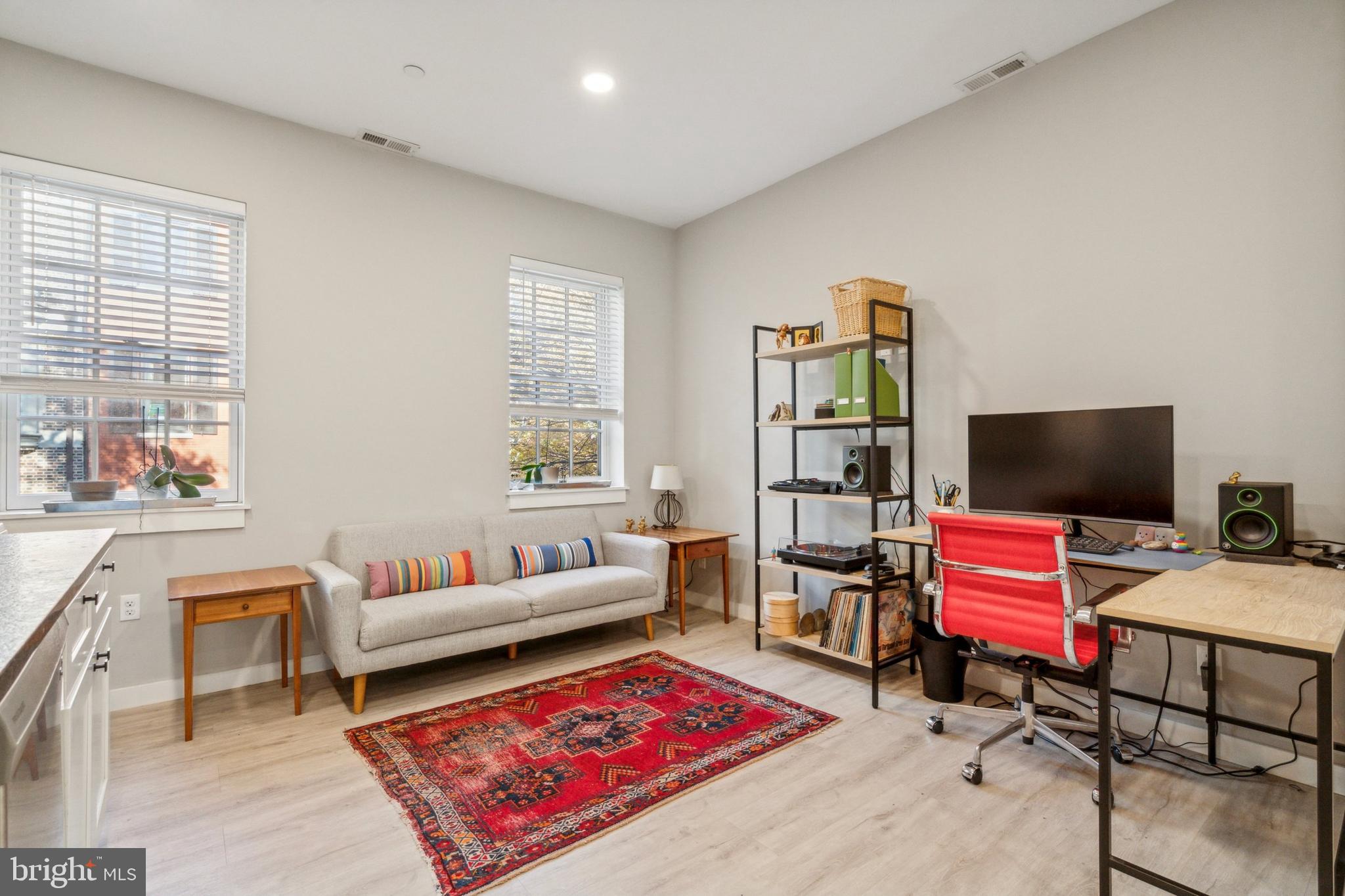 2006 Pine Street, Unit 2 Philadelphia, PA 19103 - Photo 4 of 12 a bedroom with a bed and a couch