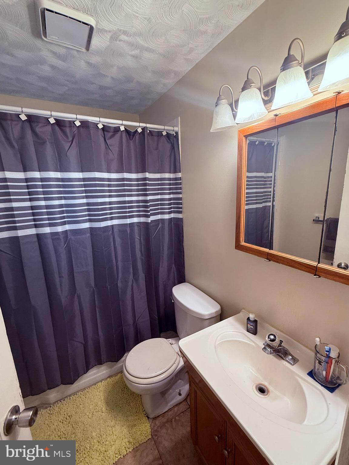 18318 Sharon Road Triangle, VA 22172 - Photo 19 of 27 a bathroom with a sink and a toilet