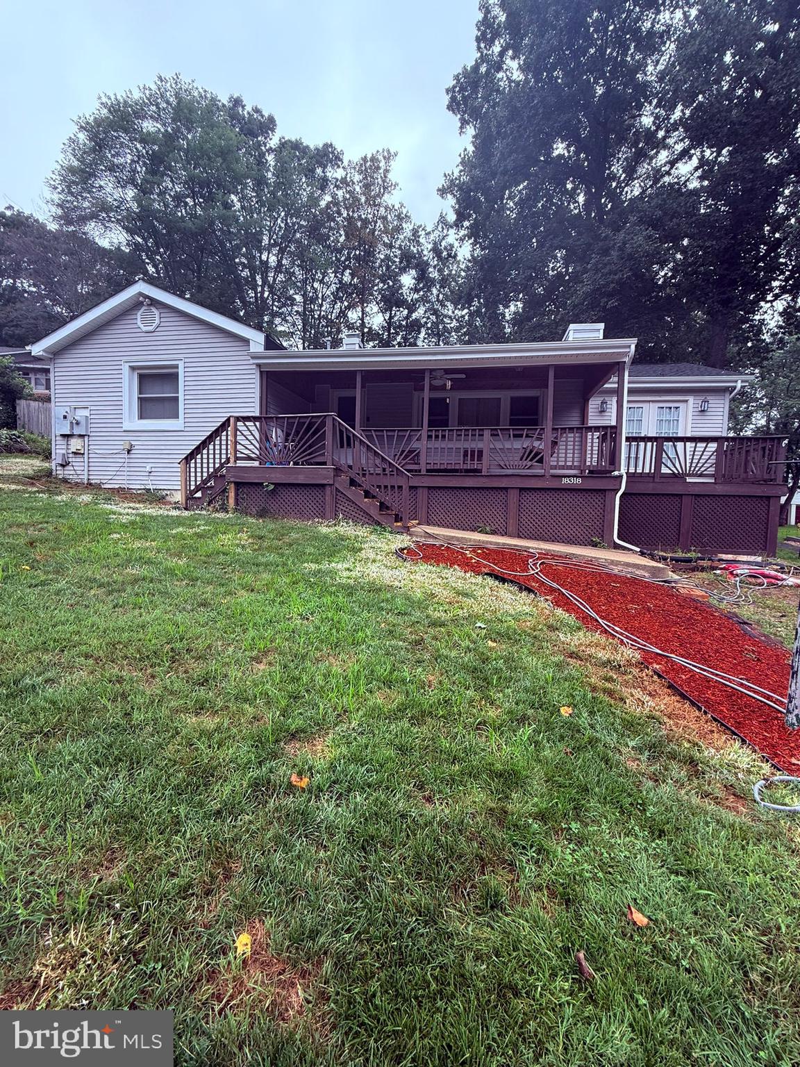 18318 Sharon Road Triangle, VA 22172 - Photo 3 of 27 a view of a house with backyard porch and garden