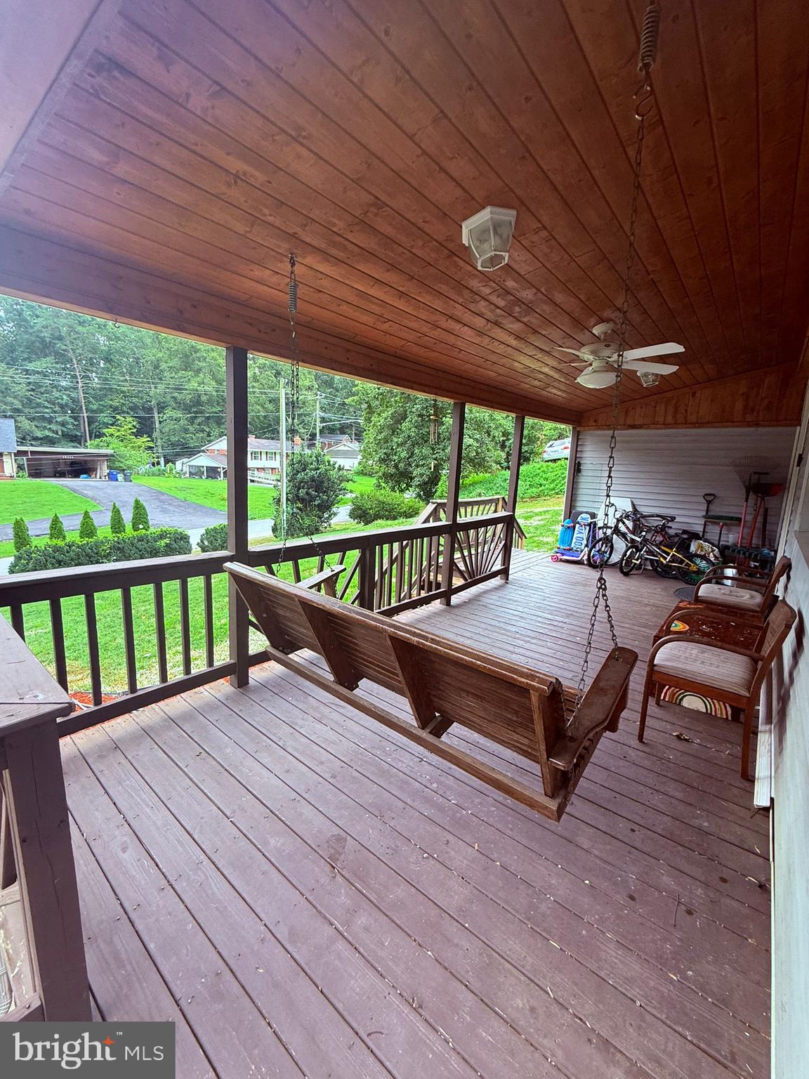 18318 Sharon Road Triangle, VA 22172 - Photo 5 of 27 a view of a deck with wooden floor and outdoor seating