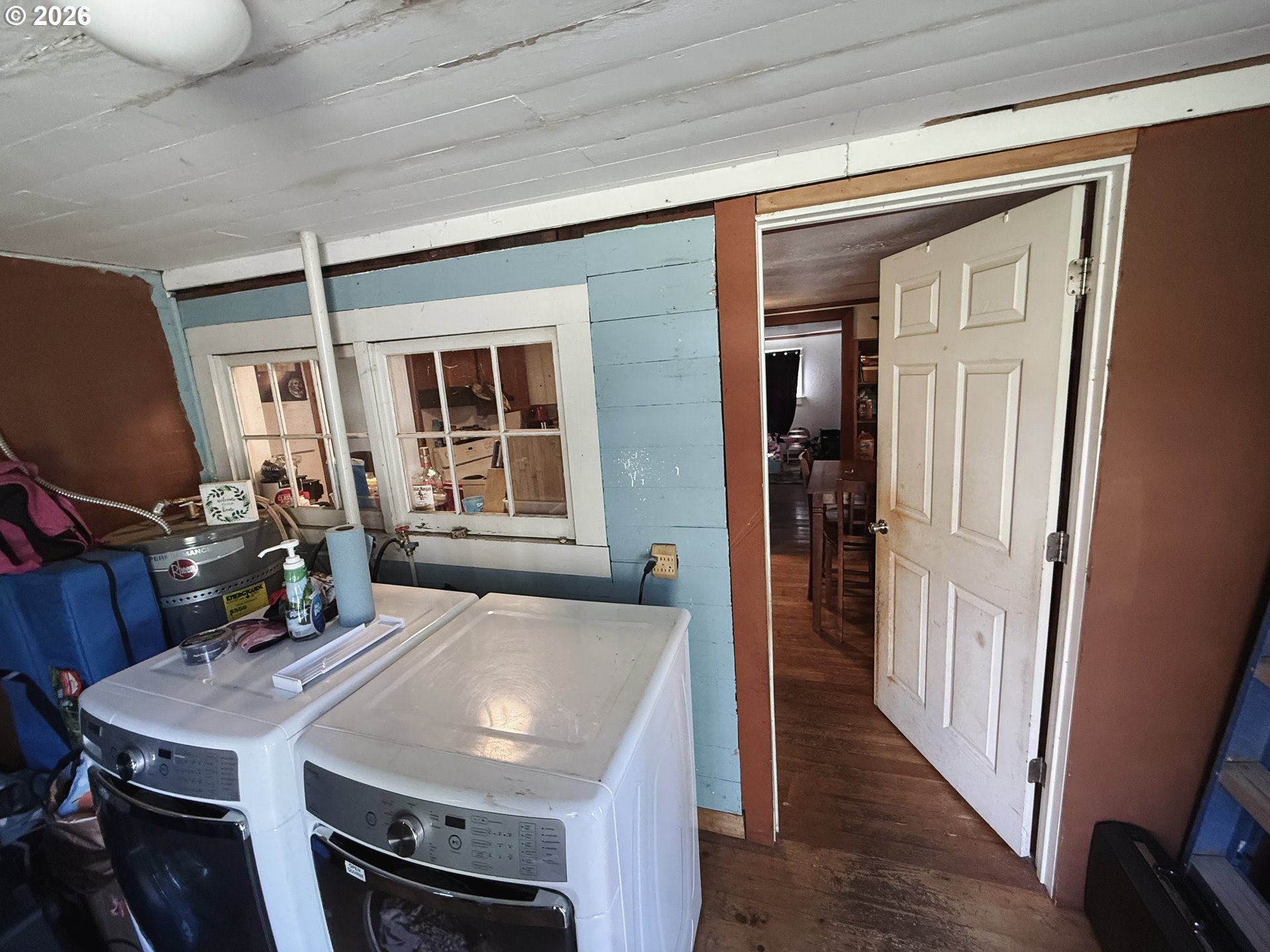 827 East 11th Street Coquille, OR 97423 - Photo 21 of 45 a view of a dining room with furniture window and wooden floor