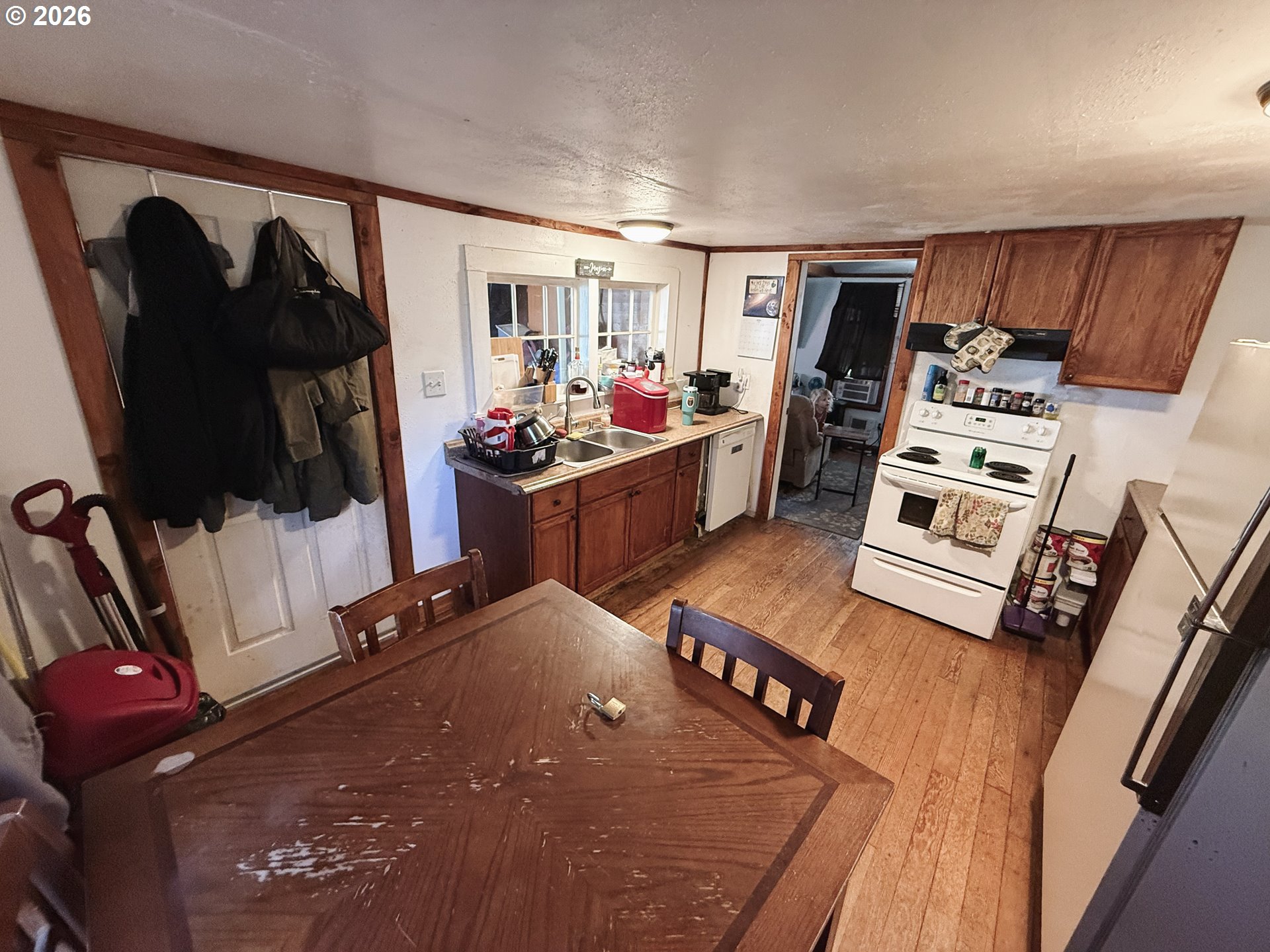 827 East 11th Street Coquille, OR 97423 - Photo 24 of 45 a living room with furniture and a flat screen tv