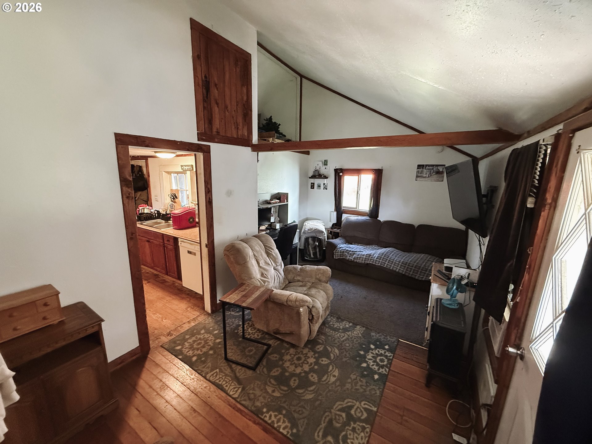 827 East 11th Street Coquille, OR 97423 - Photo 30 of 45 a living room with furniture and a window