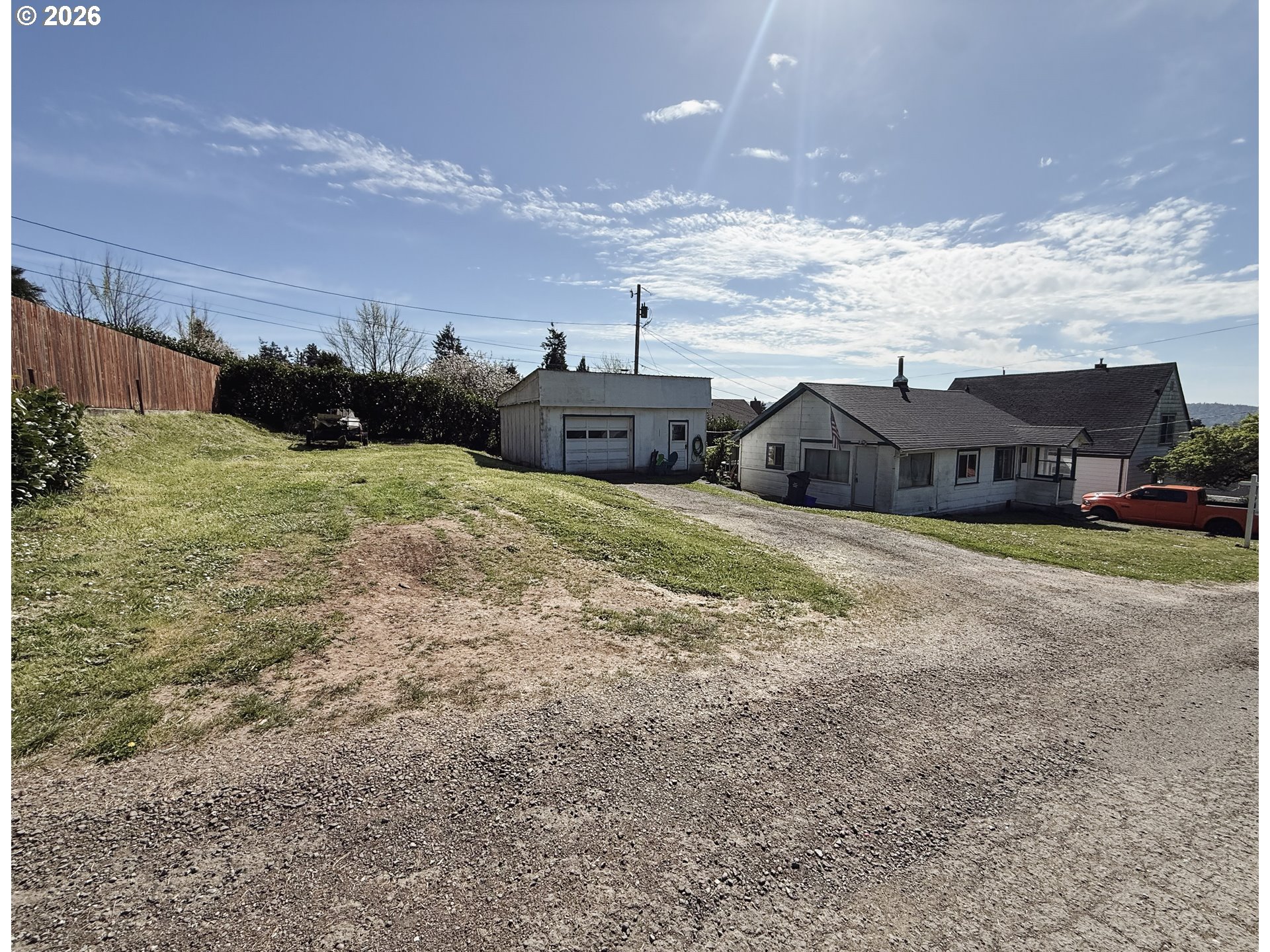 827 East 11th Street Coquille, OR 97423 - Photo 44 of 45 a view of a house with a yard