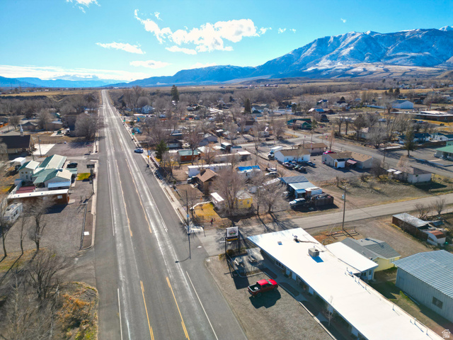 656 South Bullion Canyon Road Marysvale, UT 84750 - Photo 47 of 57 Aerial view of residential area featuring a mountain backdrop; featuring a view of the town of Marysvale