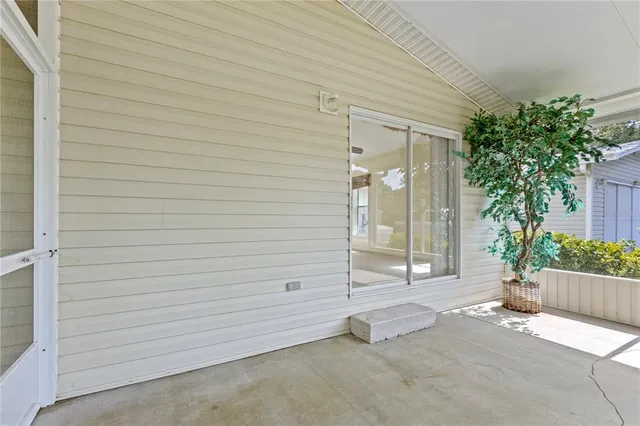 a kitchen with a stove a sink dishwasher a refrigerator and a window