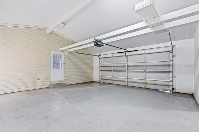 a kitchen with a refrigerator sink and microwave