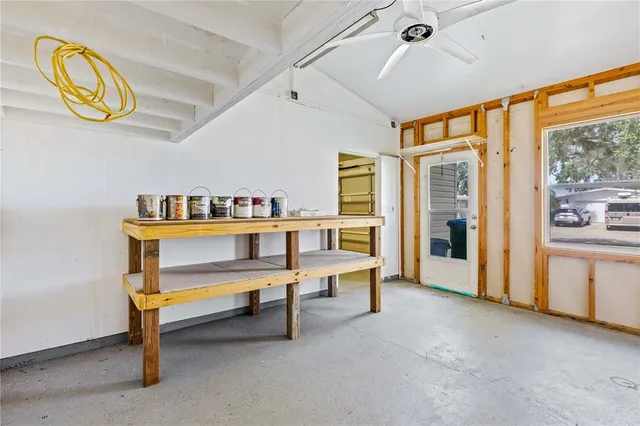 a view of a livingroom with furniture window and wooden floor