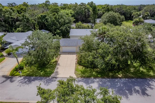 a work room with furniture and a wooden floor