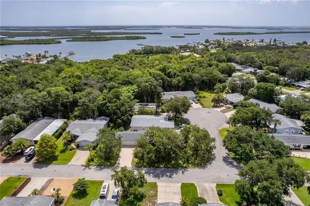 a view of a swimming pool with a lake view