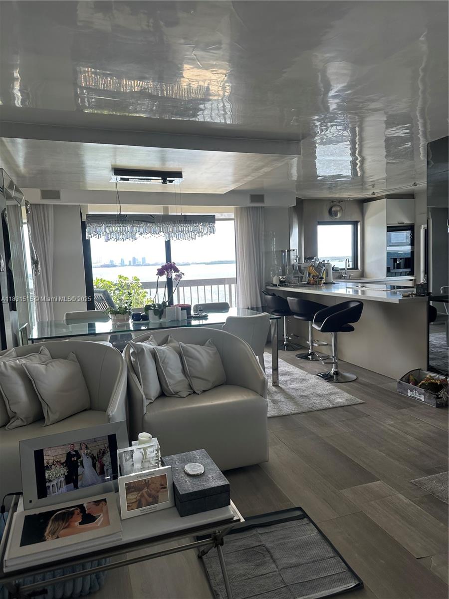 2333 Brickell Avenue, Unit 901 Miami, FL 33129 - Photo 20 of 79 a living room with furniture and view of kitchen