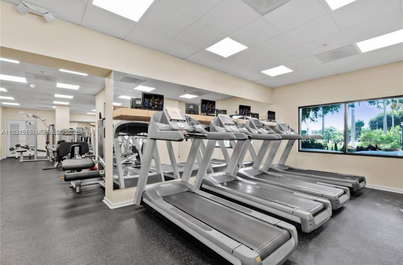 2333 Brickell Avenue, Unit 901 Miami, FL 33129 - Photo 4 of 79 a view of a room with gym equipment