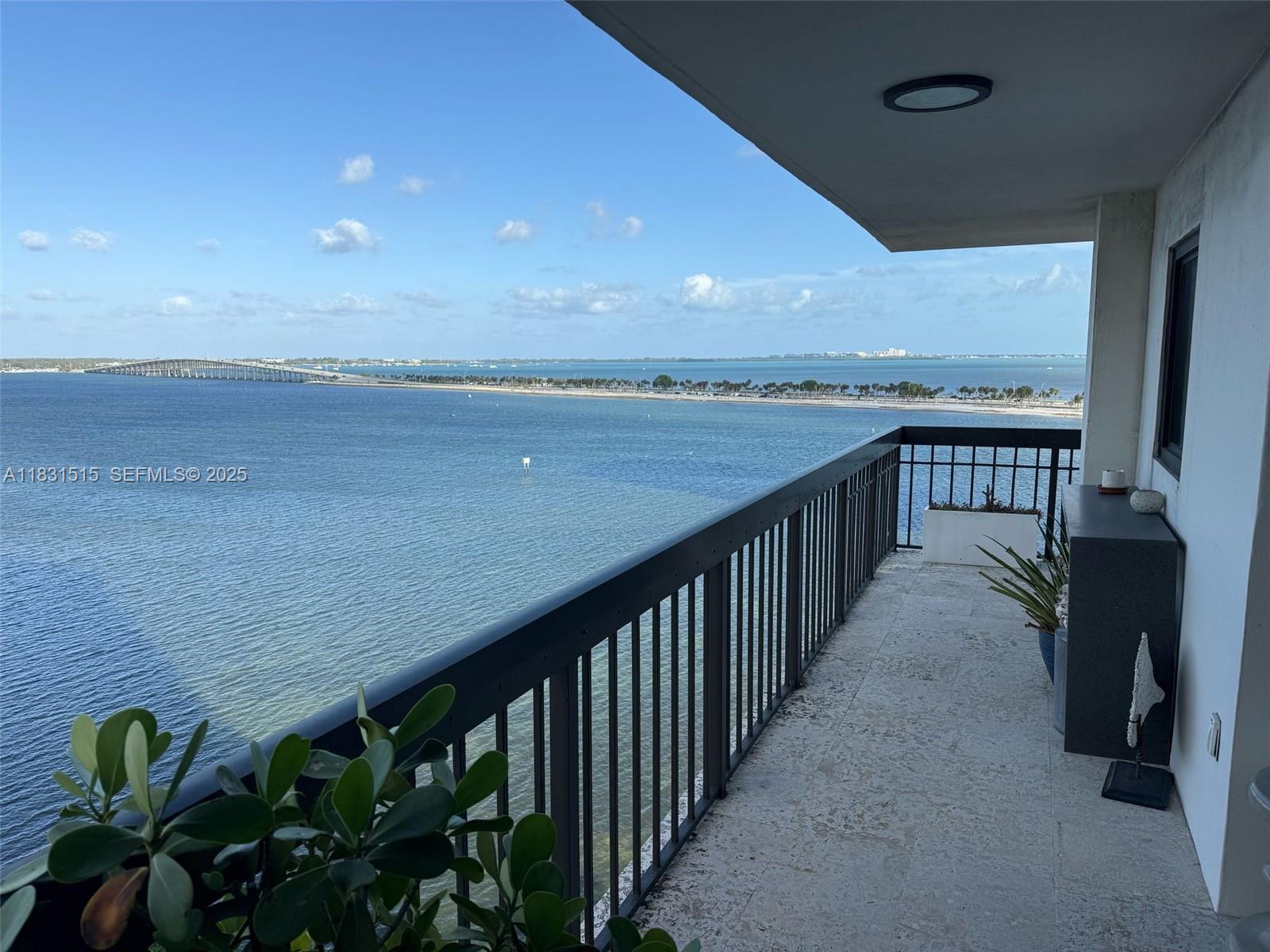 2333 Brickell Avenue, Unit 901 Miami, FL 33129 - Photo 62 of 79 a view of a balcony with an ocean view