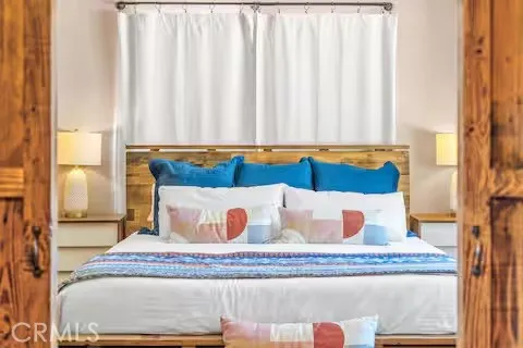 a view of a house with swimming pool and sitting area