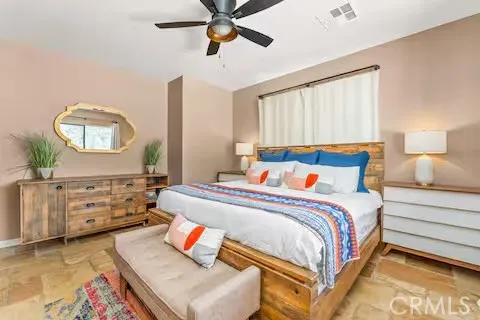 a view of a terrace with furniture and a yard